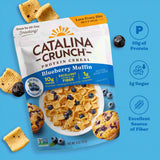 Catalina Crunch Blueberry Muffin protein cereal packaging on a blue background with nutritional information.