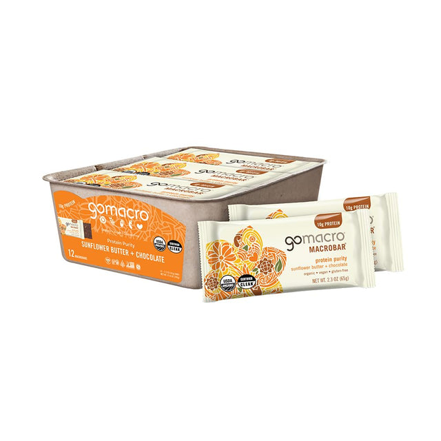 Box of gomacro protein bars with a few bars displayed in front on a white background