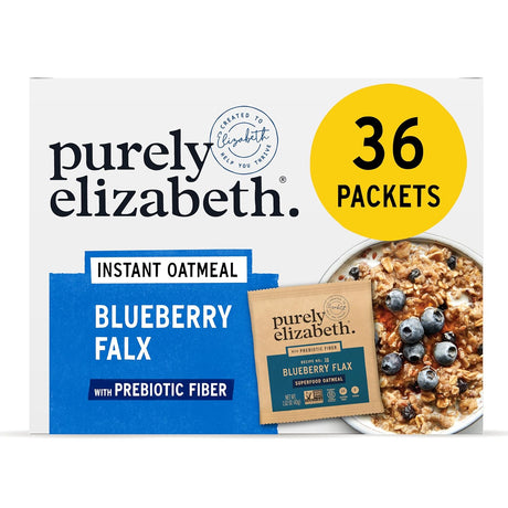 Box of purely elizabeth Blueberry Flax instant oatmeal with a bowl of oatmeal and blueberries on a white background.