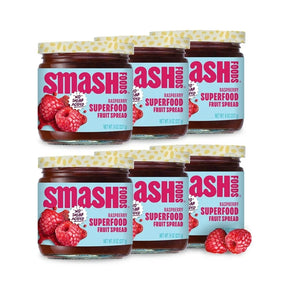 Jars of Smash and Ash Foods Raspberry Superfood Fruit Spread on a white background