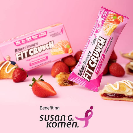 Fit Crunch bars with strawberries and pastries on a pink background, benefiting Susan G. Komen.