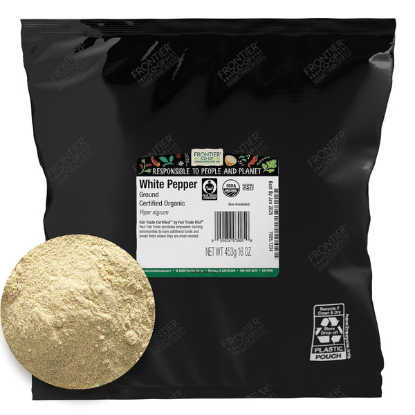 Black bag of Frontier Co-op white pepper with a sample of ground white pepper on a white background