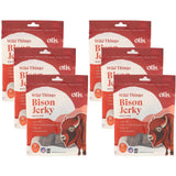 six packages of Wild Things Bison Jerky for dogs  on a white background