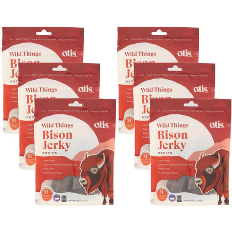 six packages of Wild Things Bison Jerky for dogs  on a white background
