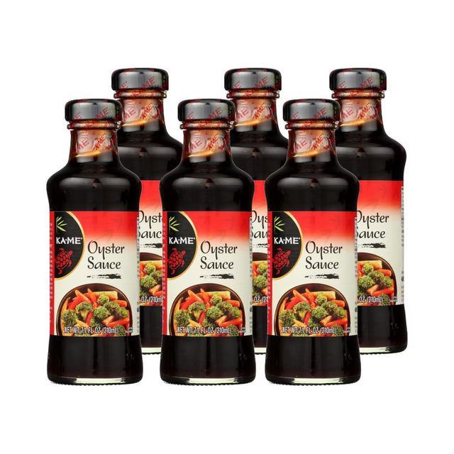 Six bottles of Kame Oyster Sauce on a white background