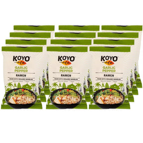 Koyo Garlic Pepper Ramen packages with a bowl of ramen on a white background