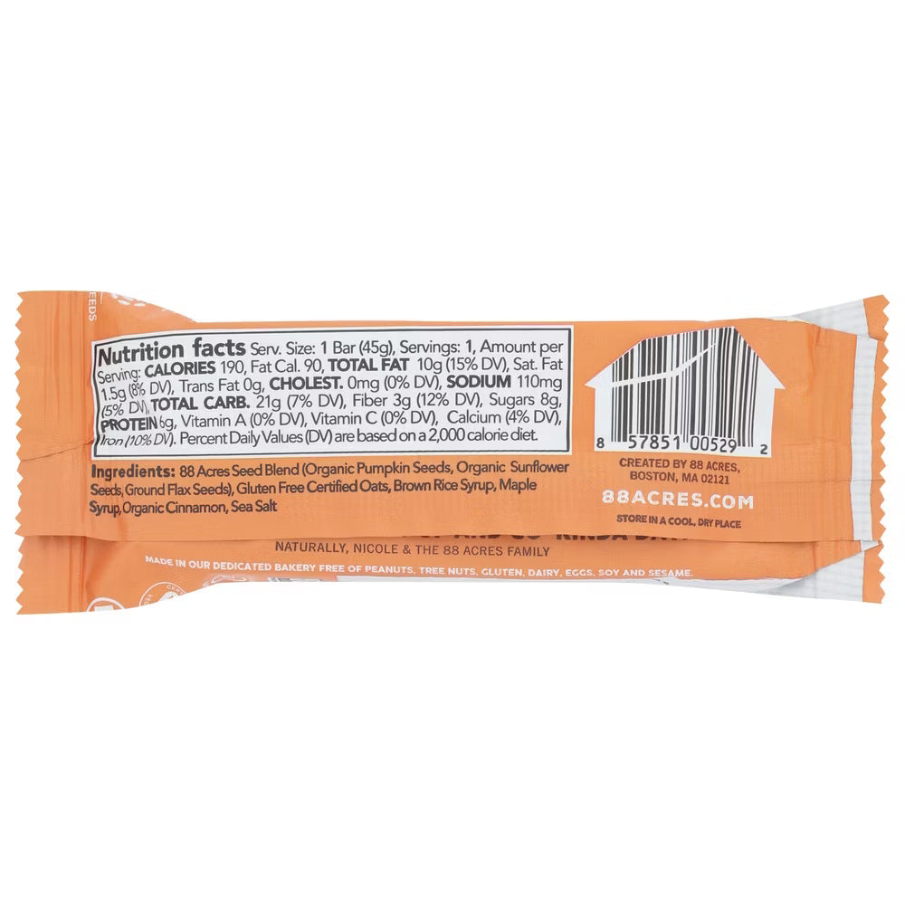 Back view of an orange snack bar packaging with nutrition facts and ingredients listed.