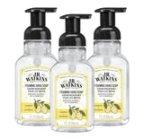 Three bottles of J.R. Watkins foaming hand soap with lemon scent on a white background
