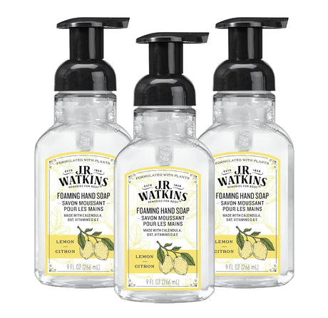 Three bottles of J.R. Watkins foaming hand soap with lemon scent on a white background