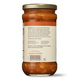 Jar of minestrone soup with a visible label on a white background