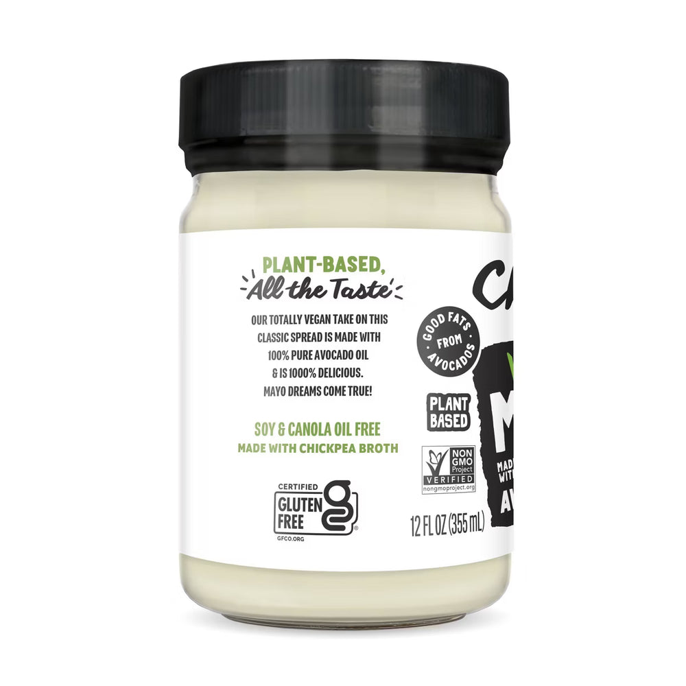 Jar of plant-based spread with a black lid on a white background