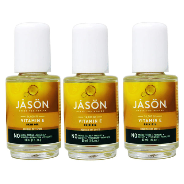 Three bottles of Jason Vitamin E Skin Oil on a white background