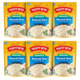 Multiple packages of Tasty Bite Organic Basmati Rice on a white background