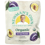 Newman's Own Organic pitted prunes packaging on a beige background