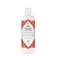 Nubian Heritage Coconut and Papaya body lotion bottle with a decorative label on a white background