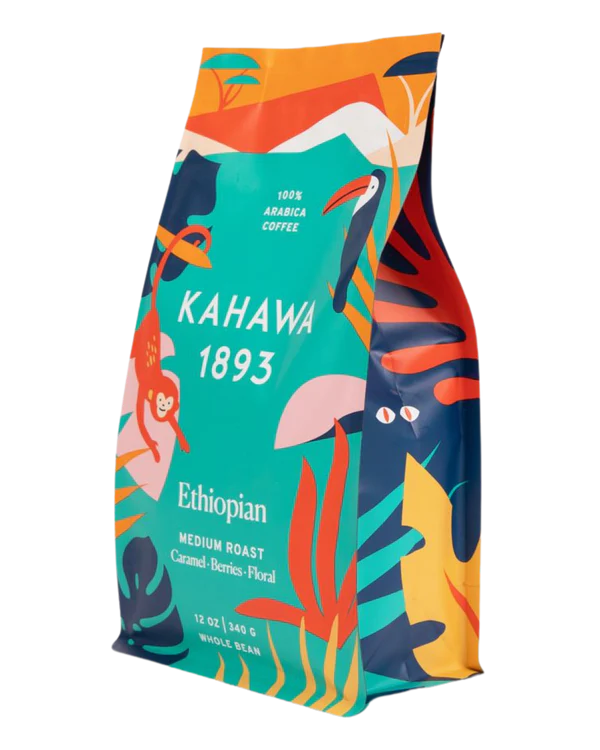 A brown bag of Kahawa 1893 coffee beans with a black and white label and a red and white Kenyan flag in the background