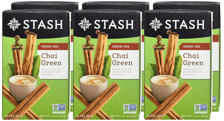 Six boxes of Stash Chai Green tea with green and black design.