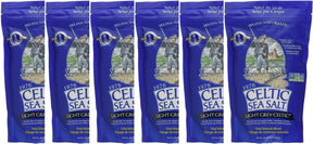Six packages of Celtic Sea Salt on a white background