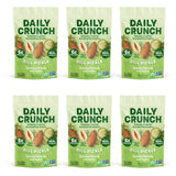 Six packs of Daily Crunch Dill Pickle snack bags on a white background