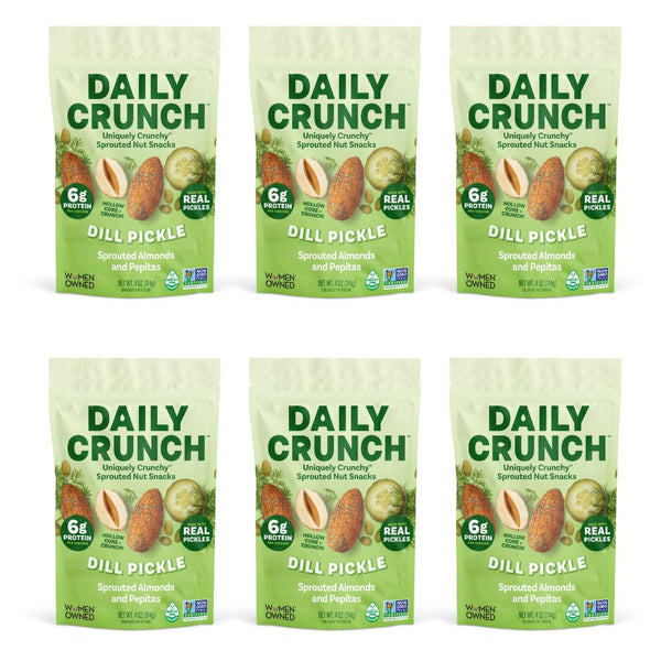 Six packs of Daily Crunch Dill Pickle snack bags on a white background