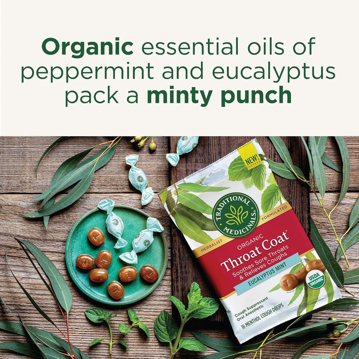 Traditional Medicinals Organic Throat Coat package with peppermint and eucalyptus on a wooden surface
