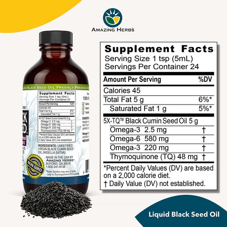 Bottle of Liquid Black Seed Oil with supplement facts label on a white background
