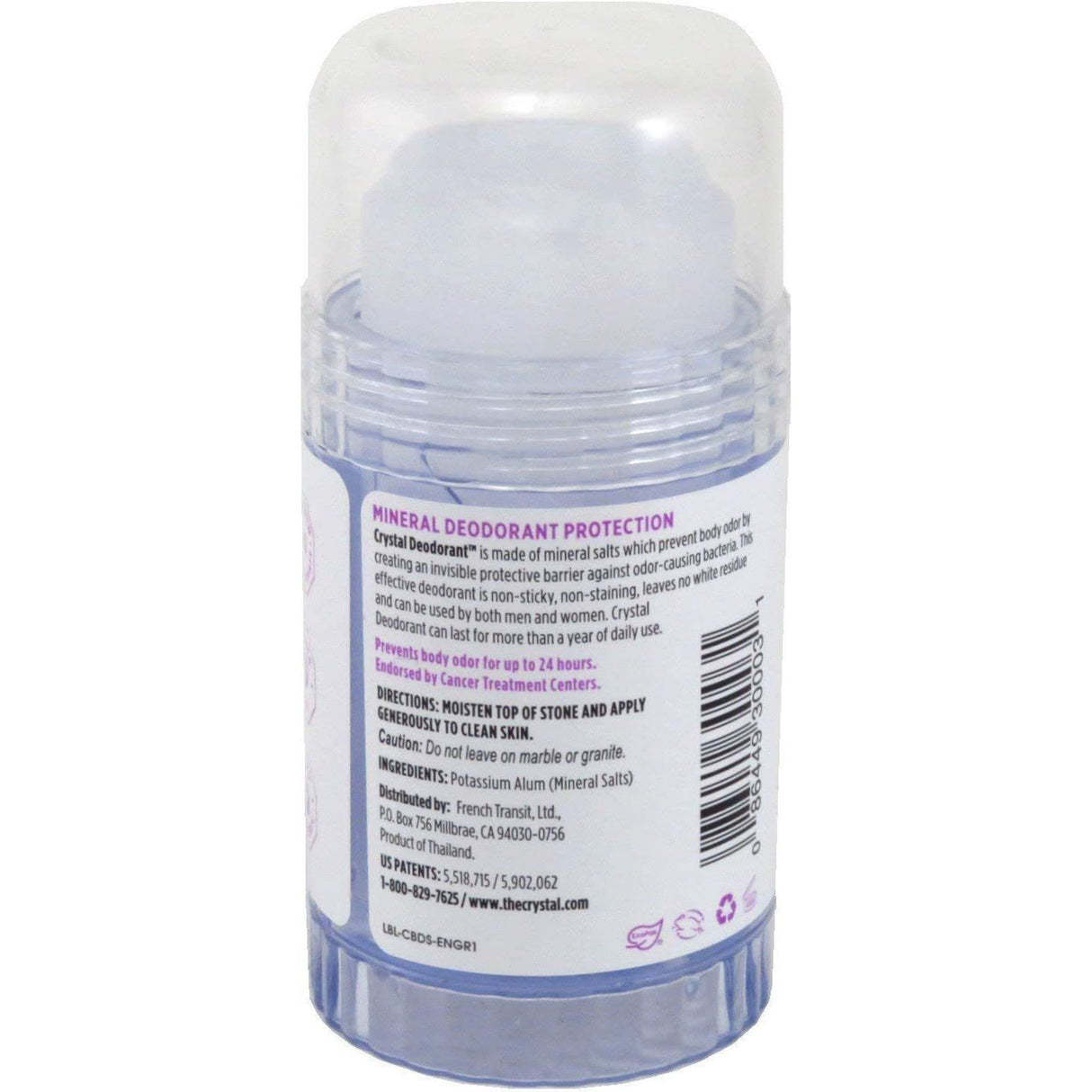 Clear deodorant stick with a label on a white background