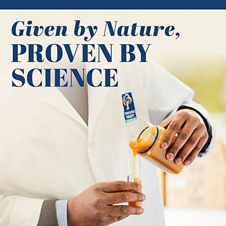 Person in a white coat holding a container of orange juice with a brand logo, text 'Given by Nature, Proven by Science' above.