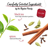Tea packaging with tea leaves, spices, and Bigelow Spiced Chai box on a white background