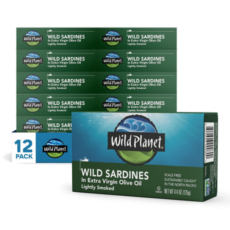Multiple boxes of Wild Planet wild sardines in extra virgin olive oil on a white background