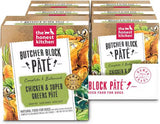 Multiple boxes of 'Butcher Block Pété' dog food from 'The Honest Kitchen' with chicken and super greens on packaging.