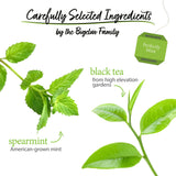 Tea bag packaging with green leaves and text about tea ingredients on a white background