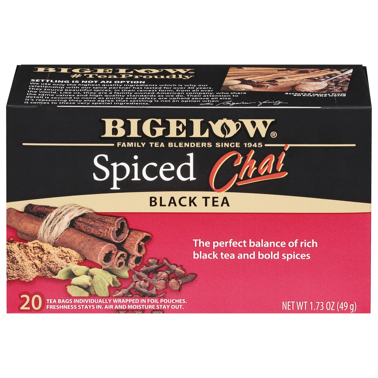 Box of Bigelow Spiced Chai Black Tea with cinnamon sticks and spices on a white background