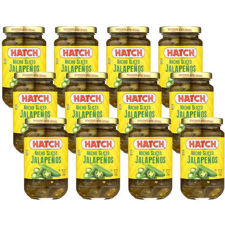 Twelve jars of Hatch Nacho Sliced Jalapeños on a white background